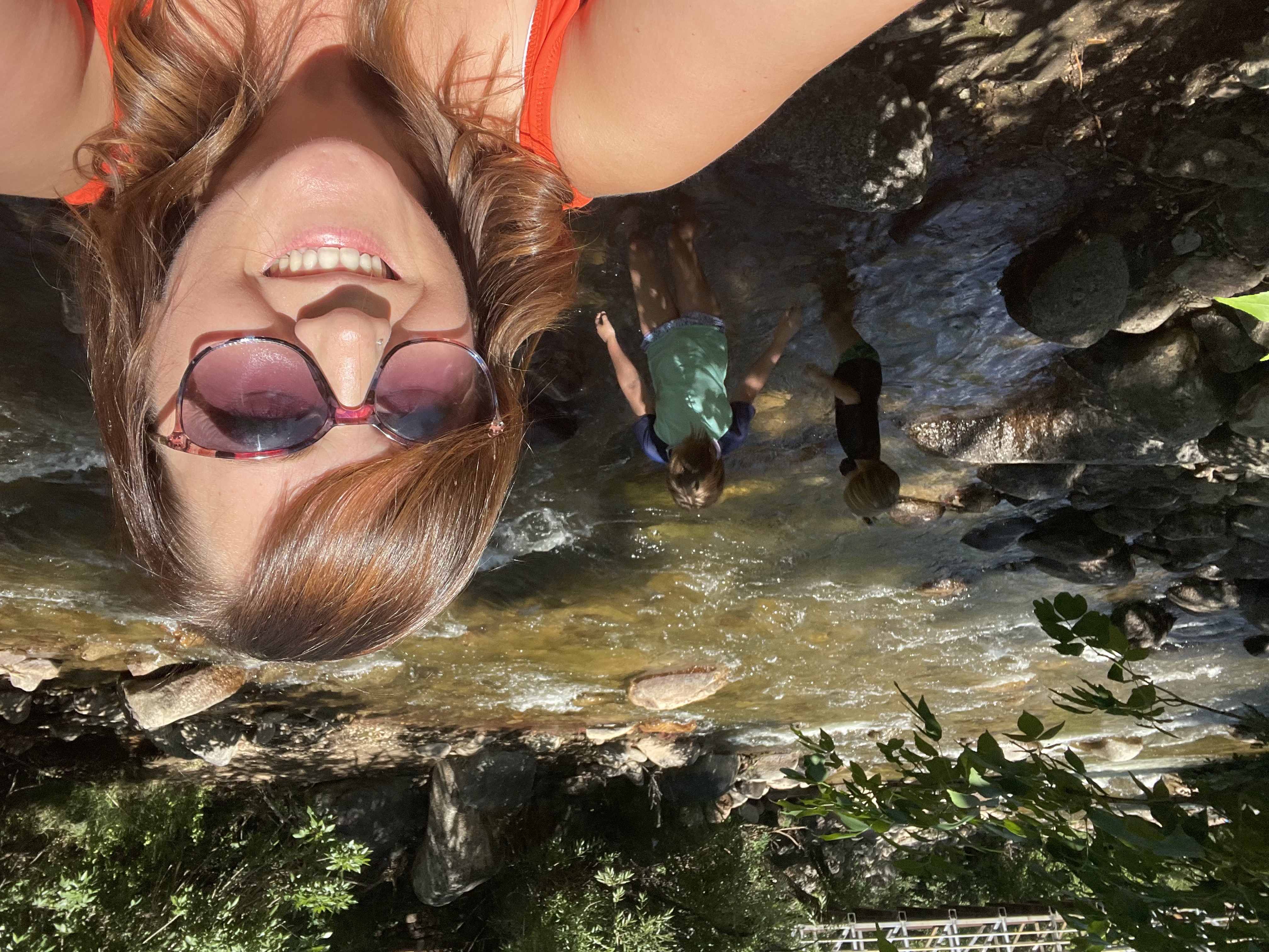 Kristin at the river on a sunny day